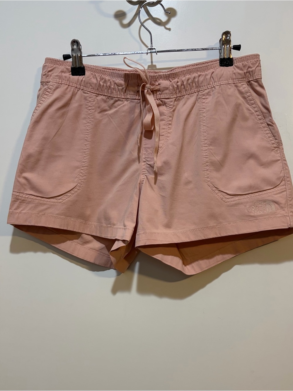 The North Face Light Pink Pull-On Motion drawstring shorts
Size small